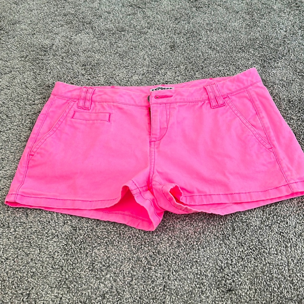Express neon pink shorts.